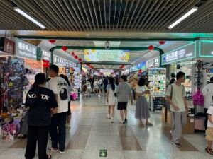 Inside Yiwu Toy Market corridors - China's largest toy wholesale district with thousands of toy suppliers. Browse anime figures, drones, educational toys, trending toys and novelties from verified manufacturers.