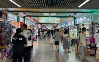 Inside Yiwu Toy Market corridors - China's largest toy wholesale district with thousands of toy suppliers. Browse anime figures, drones, educational toys, trending toys and novelties from verified manufacturers.