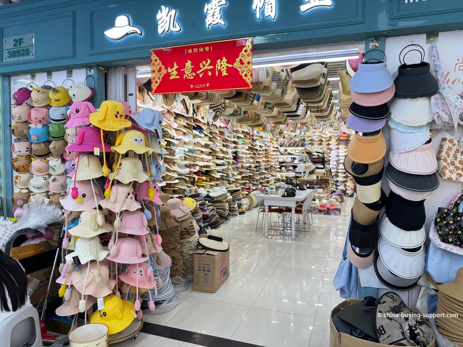 Wholesale hat shop in Yiwu District 4, children’s bucket hats and sun visors on display