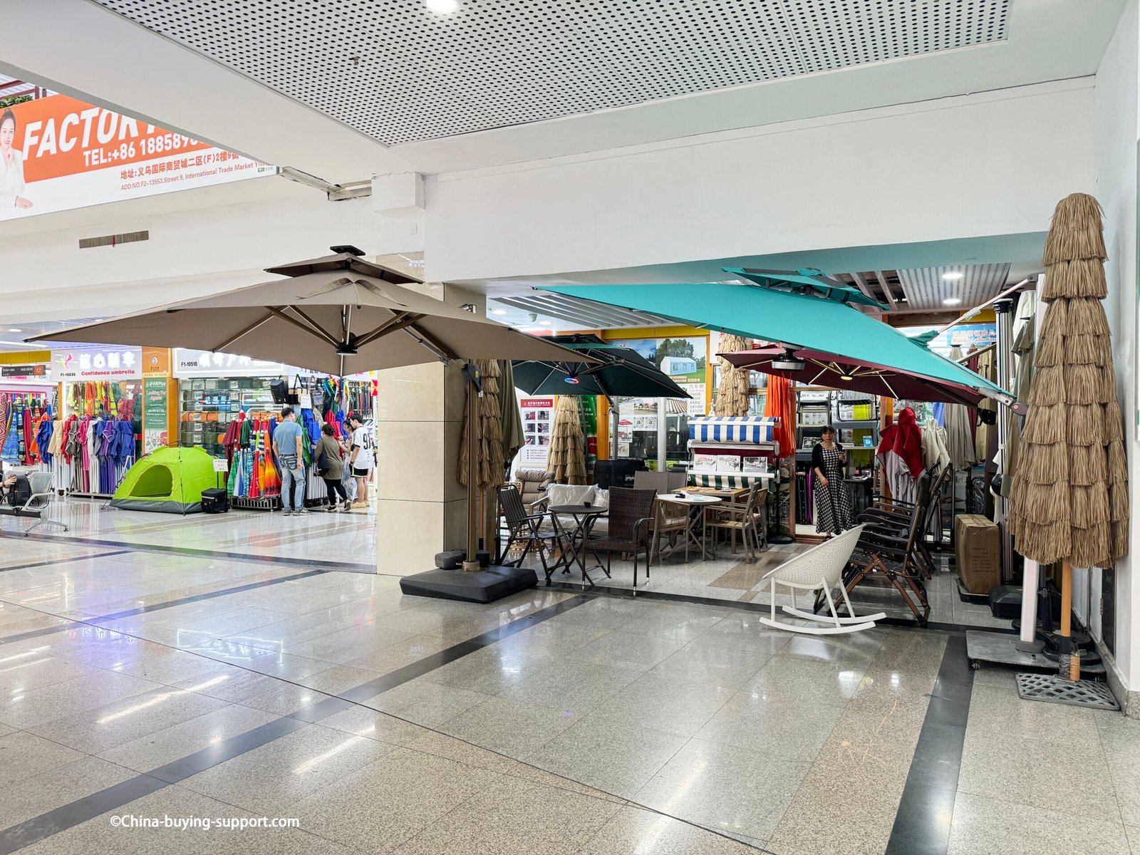 yiwu market district 2 patio umbrella showroom with cantilever parasols tiki thatch models awnings outdoor tables chairs and camping tent