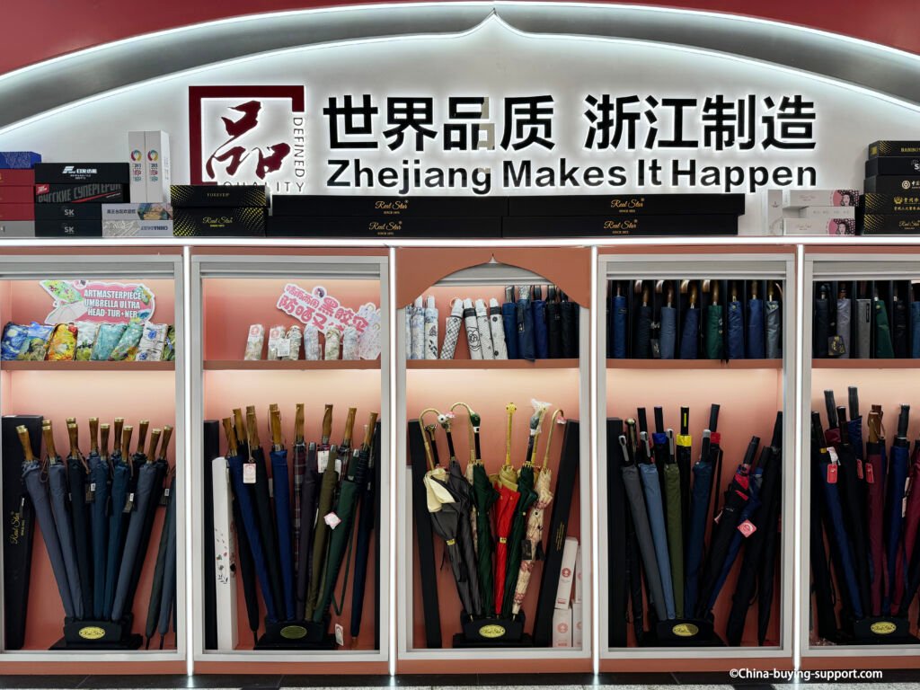 Premium umbrella factory sample wall with wooden-handle long umbrellas, boxed gift sets, folding umbrella, folding compact umbrellas