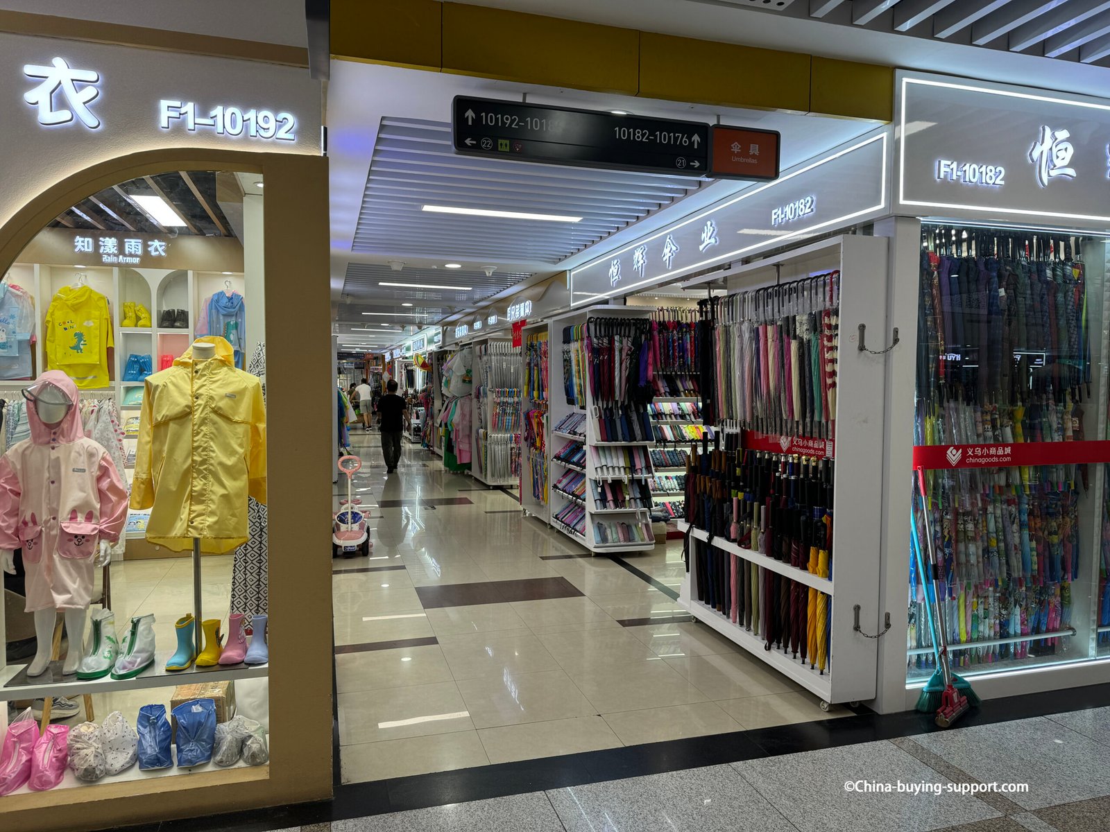 yiwu district 2 umbrella and rainwear aisle, booths F1-10192 and F1-10182, compact and long-handle umbrellas, kids raincoats