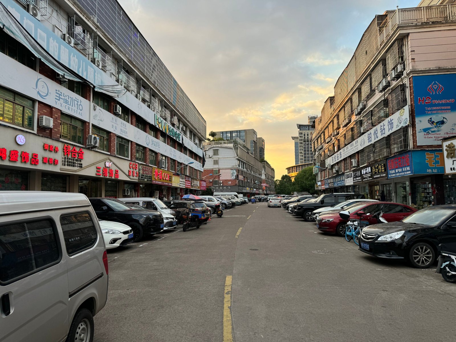 Sunset view along Yiwu wholesale accessories street with shops for beads, chains, crimp beads, cord ends and DIY jewelry supplies.