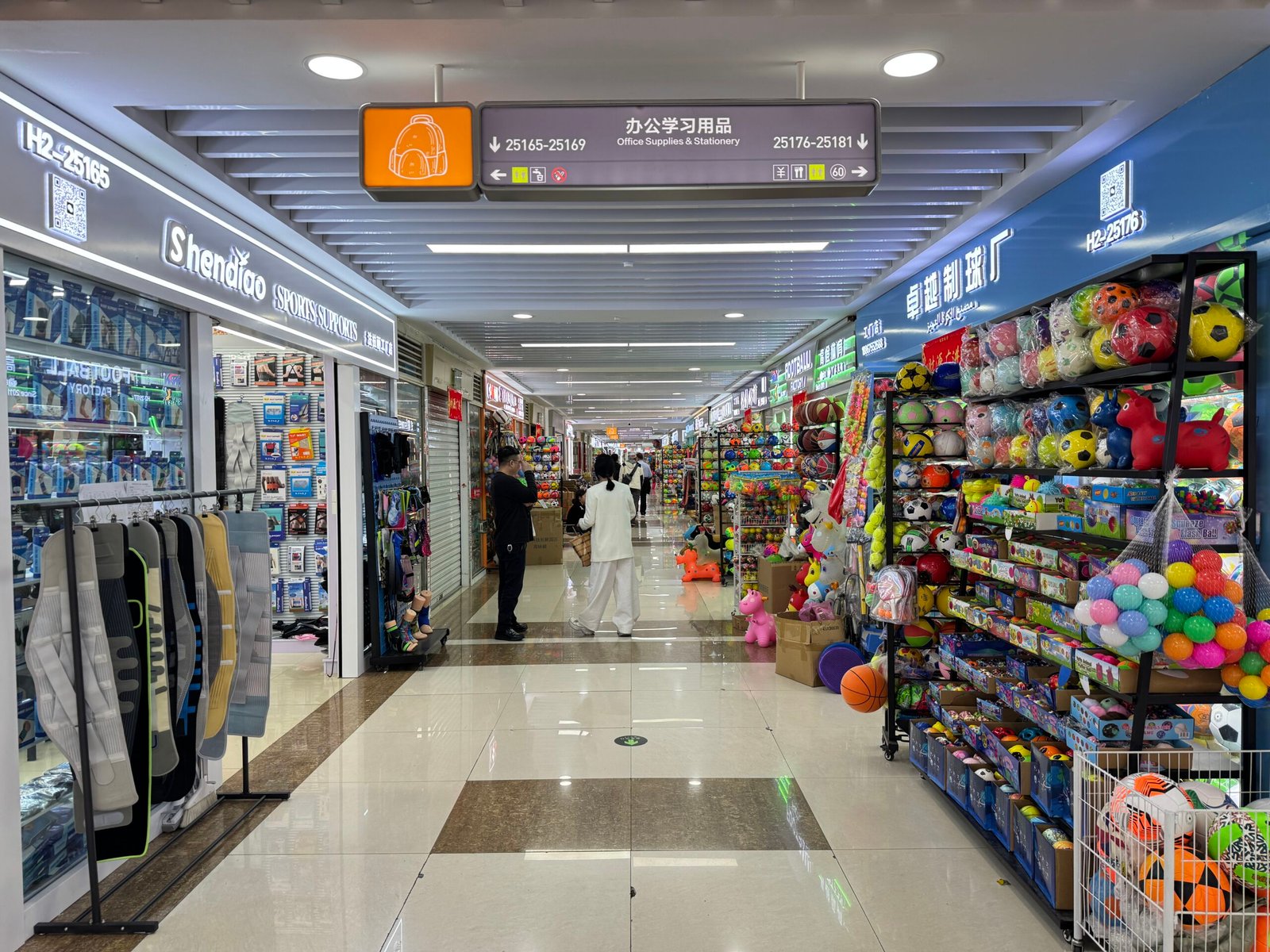buyers walking in Yiwu sports market District 3 aisle sports suppliers China