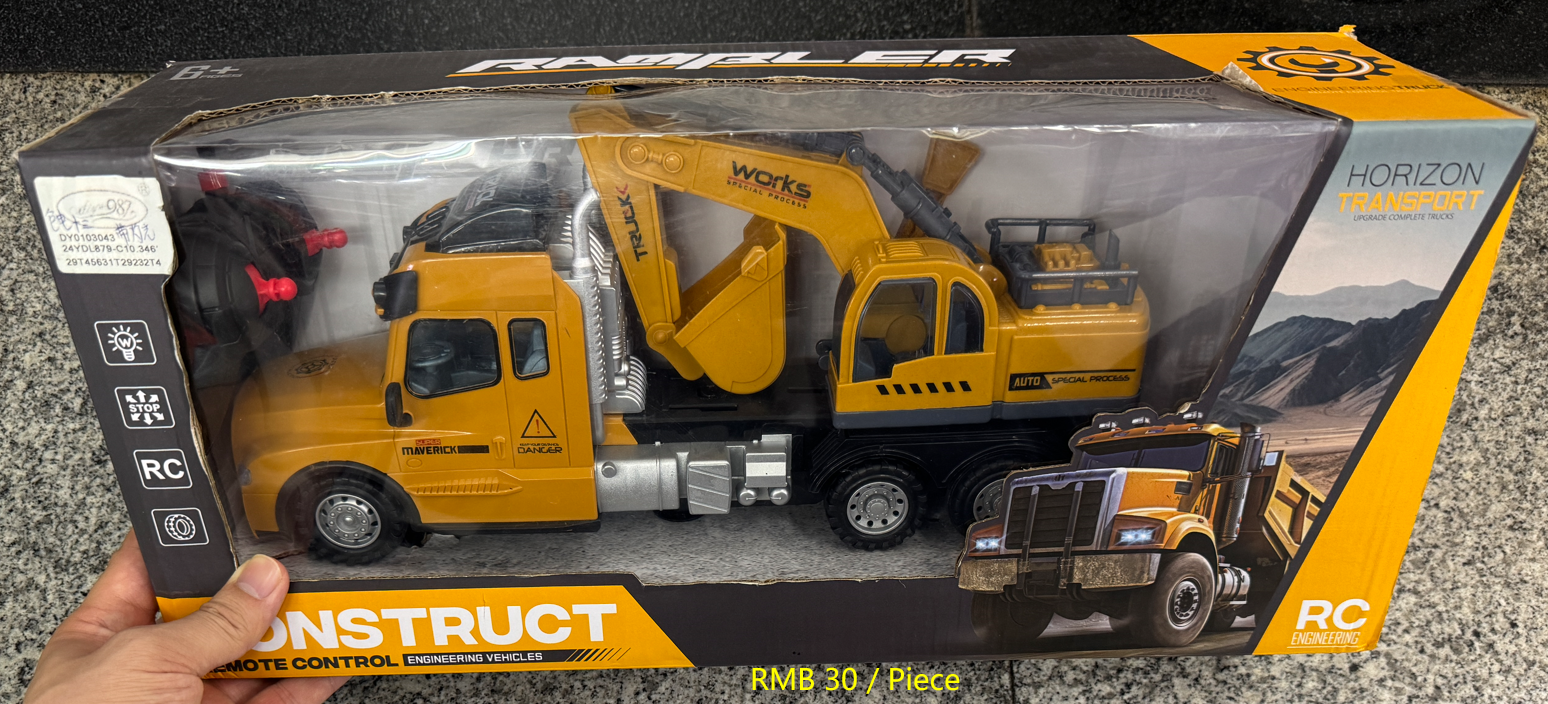 Yellow RC engineering excavator truck with movable arm and remote control at Yiwu toy market wholesale