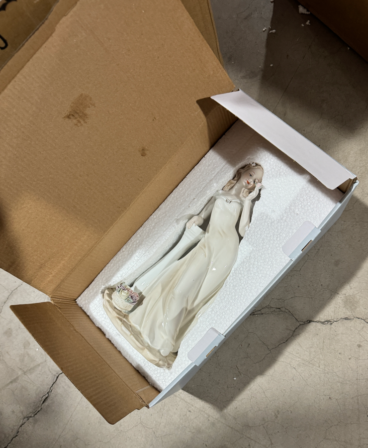 White porcelain European lady figurine securely packed in custom-cut foam insert inside a white inner box and export carton — showing the individual packaging method used by a Yiwu ceramic figurines wholesale supplier for safe international shipping