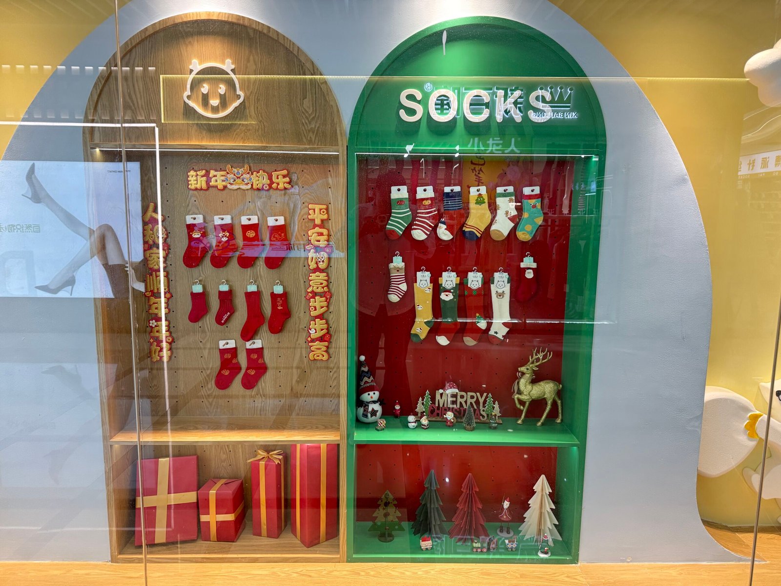 Children’s and festive socks displayed in a Yiwu socks wholesale market showroom